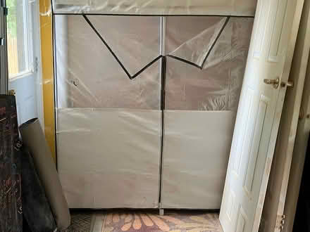 Photo of free Zippered clothes storage rack (Langley wa) #1