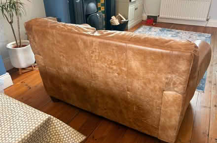 Photo of free 2 seater Brown leather sofa (South Belfast) #1