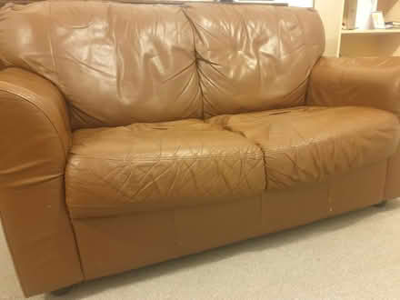 Photo of free two seater leather sofa (Thamesmead SE28) #1