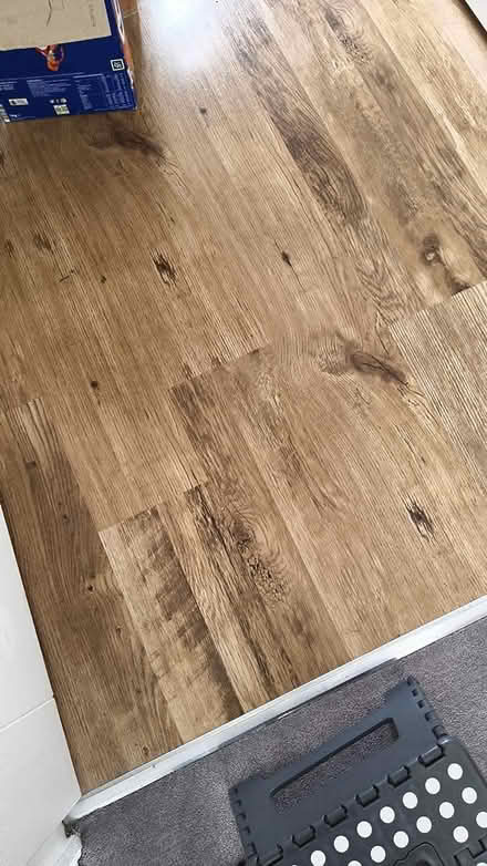 Photo of free Wood effect laminate flooring 7mm (TW3 Hounslow Central) #1