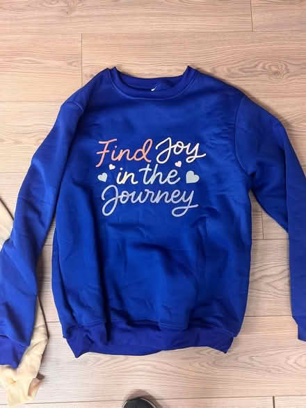Photo of free Roughly 100 free sweaters (Long Island City) #3