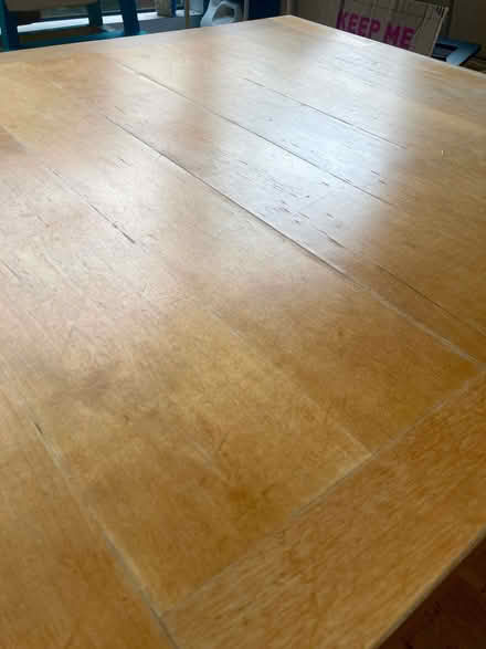 Photo of free Low wooden dining table - quite scratched - 90x90cm x42cm (Hackney E9) #2