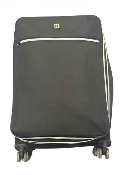 Photo of free IT Suitcase-Filled with XS Clothes (Brooklyn Storage) #1
