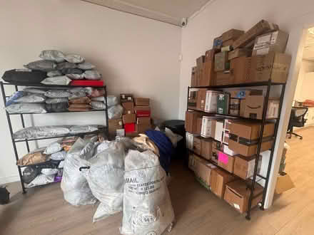 Photo of free Roughly 100 free sweaters (Long Island City) #2