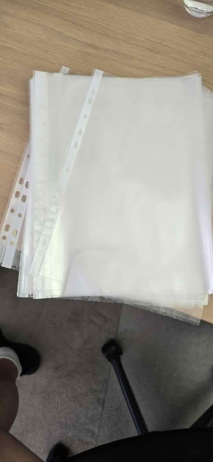 Photo of free Pile of plastic punched pockets (SG8) #1