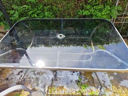 Photo of free Large glass garden table and 6 (MK2 2nf) #1