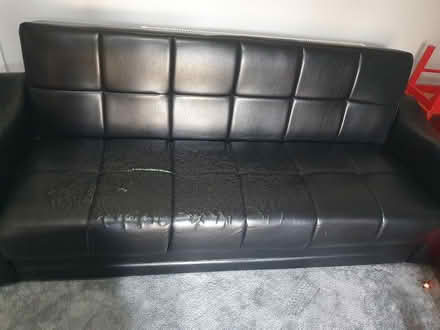 Photo of free 2 settees with throws (black) (Normanton) #2