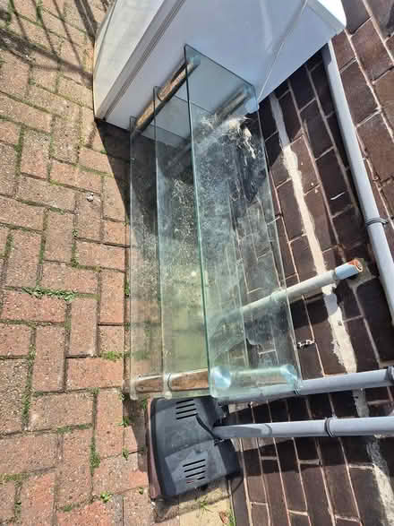 Photo of free Glass TV stand (BD4 Holmewood) #1
