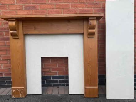 Photo of free Wooden fire surround with marble look backplate and hearth (Oxton CH43) #1