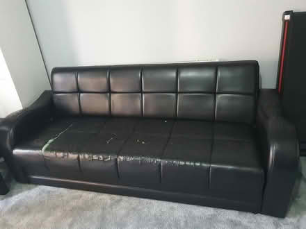 Photo of free 2 settees with throws (black) (Normanton) #1