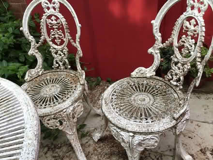 Photo of free Cast iron table and 2 chairs (EX3 topsham) #3