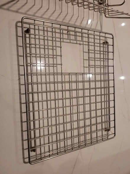 Photo of free Chrome kitchen sink 'protector' (Stoneleigh, Epsom) #1