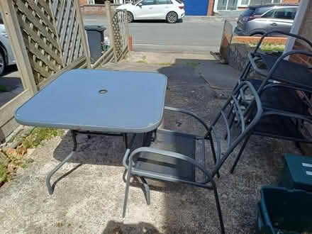 Photo of free Glass topped outdoor table & chairs (BS15) #1