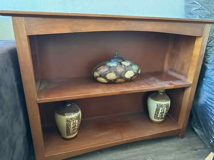Photo of free Wood cabinet with art pieces (Lafayette) #1