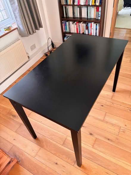 Photo of free Solid wood black table (Knotty Green HP9) #1