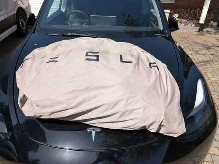 Photo of free Tesla Model Y official car cover (Purley on Thames RG31) #1