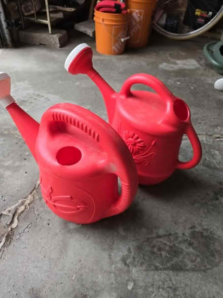 Photo of free 2 red watering cans (Vanier north) #1