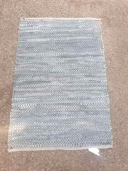 Photo of free Small blue carpet (leather and cotton) (Westerham TN16) #1