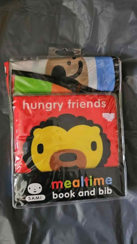 Photo of free Babies book and bib (Ramsey Mereside PE26) #1