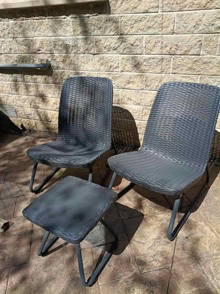 Photo of free 2 plastic ratan chairs & side table (Linthwaite HD7) #1