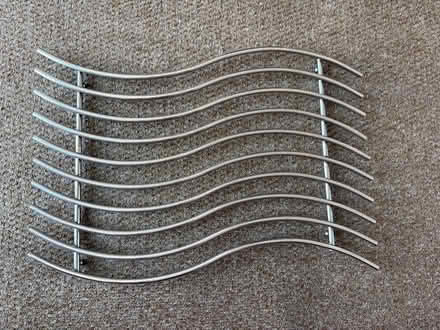 Photo of free Large 19” x 12” trivet (Welling DA16) #1