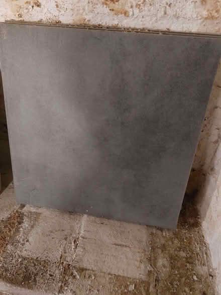 Photo of free 4 grey matt floor tiles (Wymondham NR18) #1