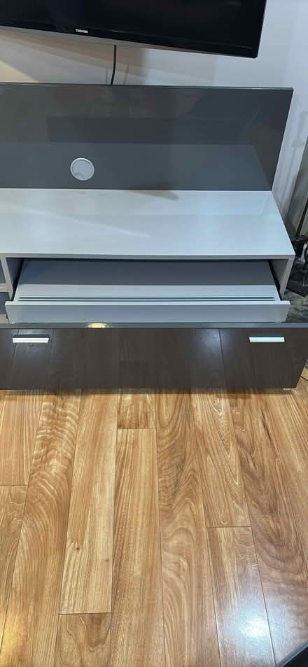 Photo of free Grey TV stand (Holland, PA) #1