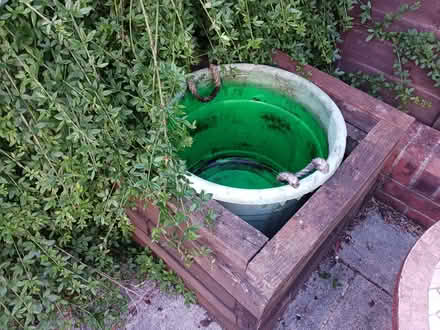 Photo of free Large Bucket and Wood Surround (Kempshott RG22) #1