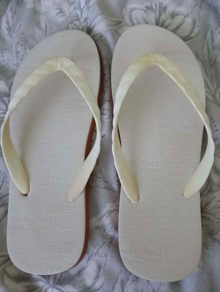 Photo of free White adult flip flops (Napsbury AL2) #1