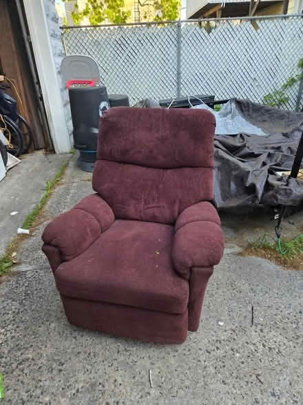 Photo of free Burgundy recliner (Throgs neck) #1