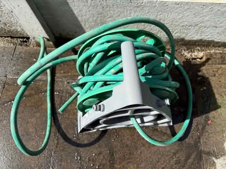 Photo of free Hozelock hose pipe and reel (Salford M30) #1