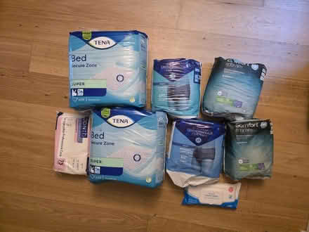Photo of free Male pads and tena waterproof bed sheets, plus wipes (Bussage GL6) #1