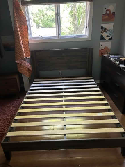 Photo of free Queen wooden bed frame w/ headboard (Upper West Side) #1