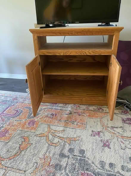 Photo of free Wood Oak TV Stand with Storage (Near Parkville High School) #1