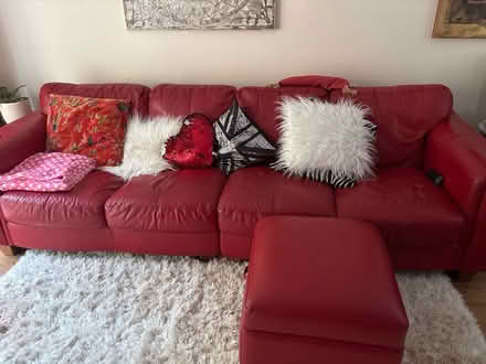 Photo of free Bright red 4 seater sofa and pouffe (Leeds LS6) #1