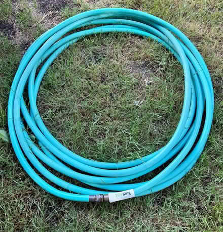 Photo of free Turf King 25 ft rubber water hose (Ballard near Adams Elementary) #1