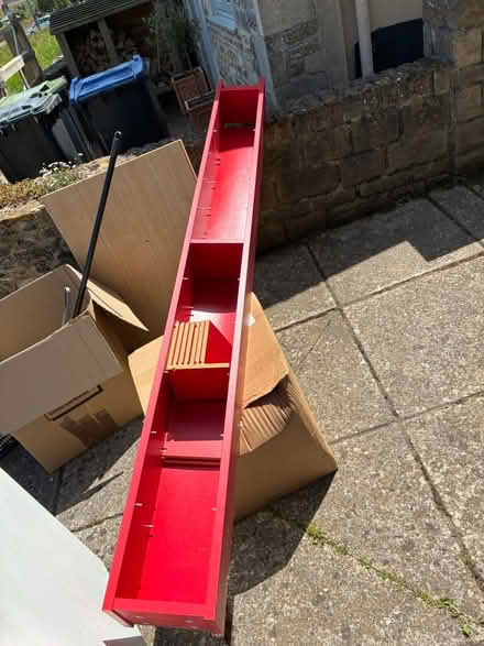 Photo of free IKEA red cd shelves (Broughton Gifford SN12) #1