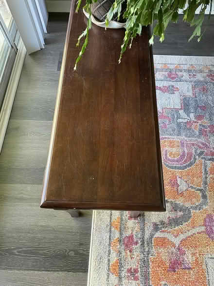 Photo of free Long low wood table (Near Parkville High School) #2
