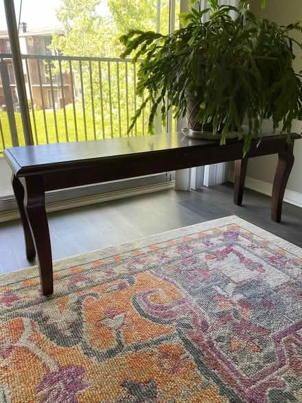 Photo of free Long low wood table (Near Parkville High School) #1