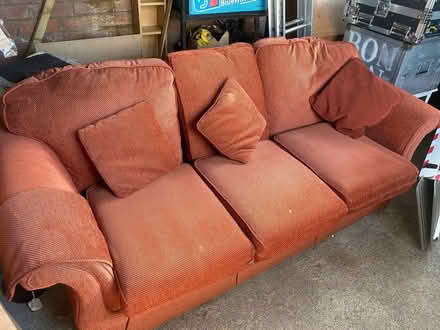 Photo of free 3 seater fabric sofa rust colour . Worn but comfortable (High Compley FY6) #1