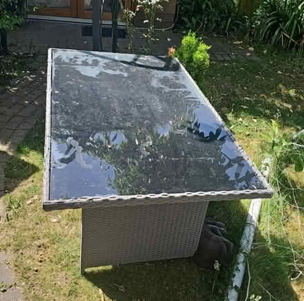 Photo of free Garden table. Large rattan needs tlc (Chiswick W4) #1