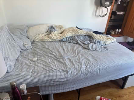 Photo of free Full size bed and bed frame (Bushwick) #1
