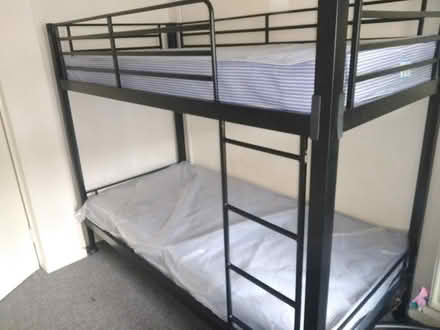 Photo of free Metal bunk bed and 2 new mattresses (69 Welsh House Farm Rd B32) #1