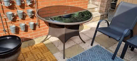 Photo of free Round glass top patio table (Shrewsbury SY1) #1