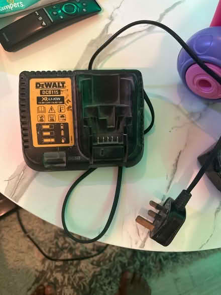 Photo of free Dewalt charger and Battery (Waverley Road. SE187TJ) #1