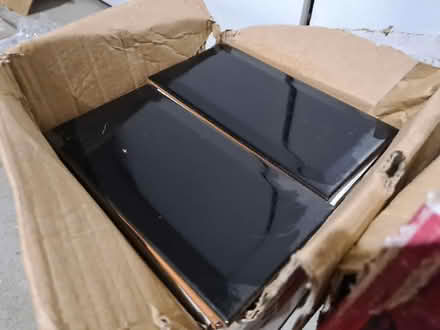 Photo of free 2 boxes of black tiles (Chorlton M21) #2