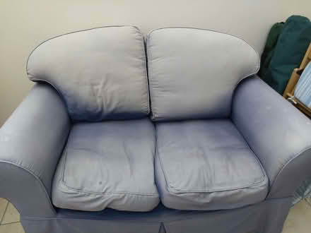 Photo of free Two 2-seater sofas - faded but comfy (West Haddon NN6) #1
