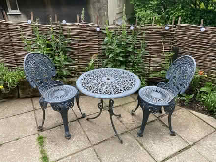 Photo of free Cast iron garden table and two chairs (Wirksworth DE4) #1