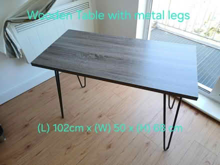 Photo of free Wooden Table with metal legs (NW9 Colindale, Tesco Express) #1