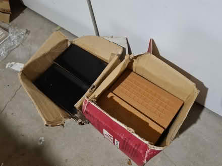 Photo of free 2 boxes of black tiles (Chorlton M21) #1